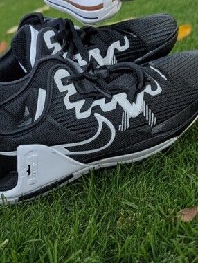 Men's Black Nike Athletic Sneakers with White Accents